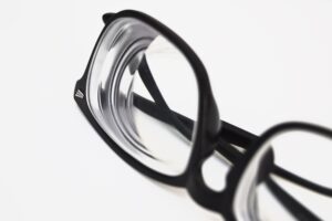 Image of black rimmed reading glasses